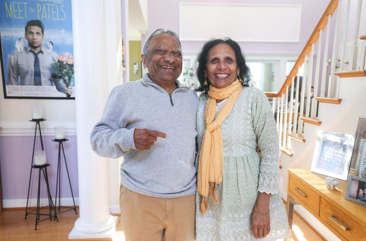 Vasant and Champa Patel pose for a portrait inside their home in Charlotte, NC on Monday, November 24, 2025. They are the parents of actor and filmmaker Ravi Patel, and are well-known for their starring roles in the 2014 documentary film Meet the Patels, which chronicles Ravi's search for a wife with their help. There will be a viewing of the film next month at Independent Picture House. 