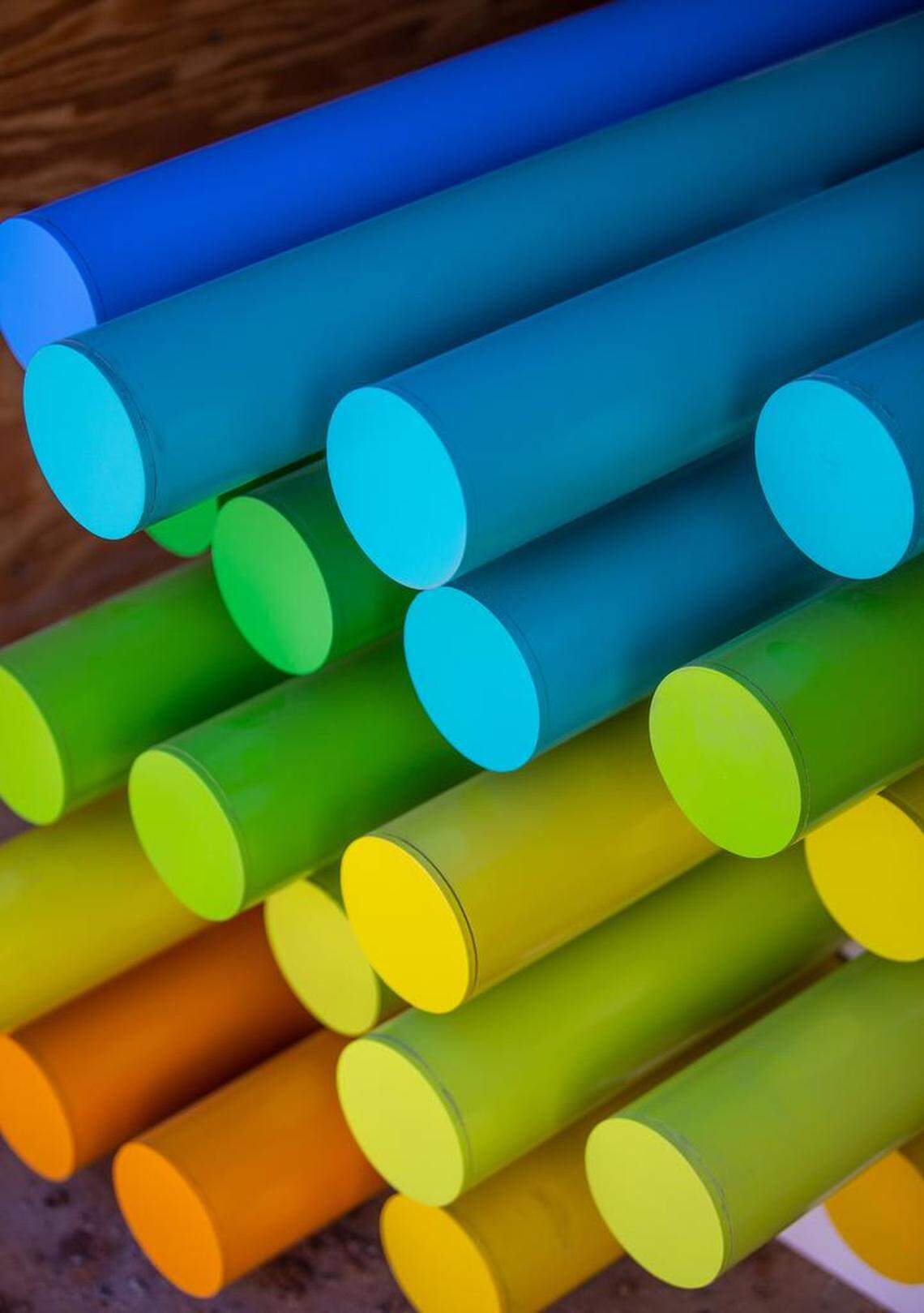 The poles were loaded by number to streamline installation of “The Color Forest.”