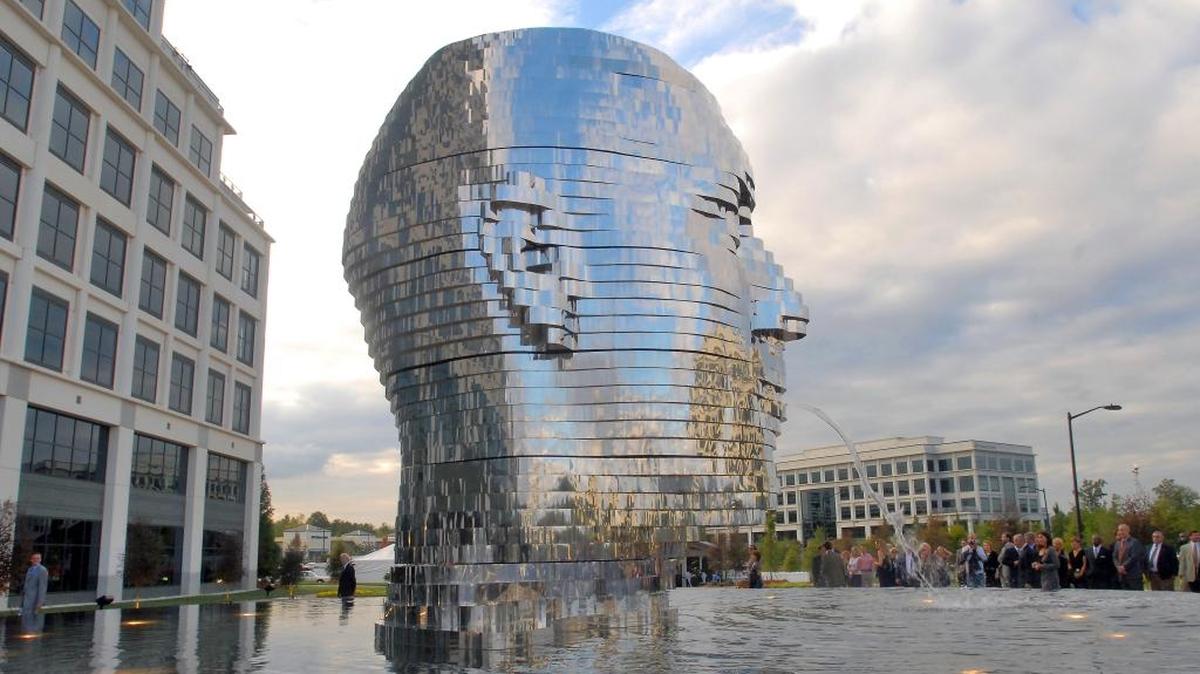 Czech sculptor David Cerny’s “Metalmorphosis” at its unveiling at Whitehall Corporate Center on Arrowood Road at Interstate 485. Count Arco, the Charlotte developer who conceived the sculpture and was the great-grandson of the last King of Bavaria, has died in his native Austria. 