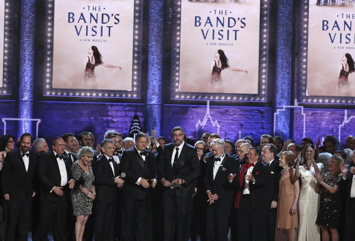 Orin Wolf on Gabbard: “The legacy of his work will be felt for generations.” Here, Wolf (center) and cast/crew of “The Band’s Visit” accept the 2018 Tony for best musical.