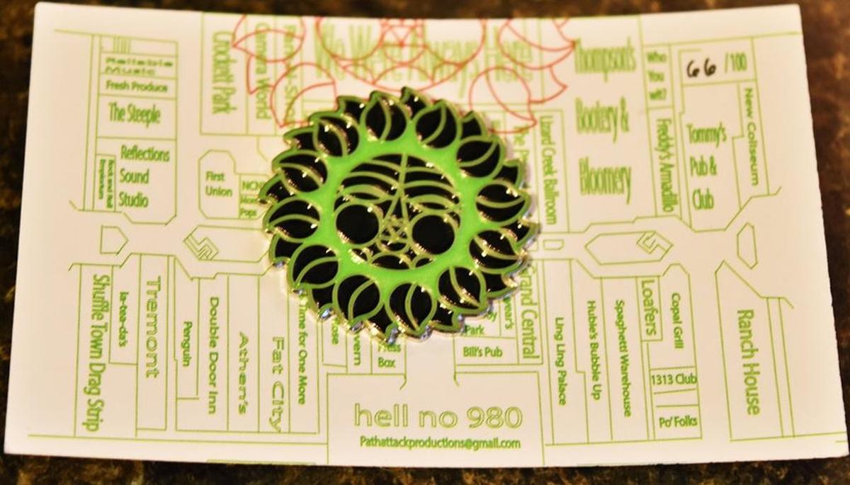 This enamel lapel pin pays homage to Charlotte’s Eastland Mall.