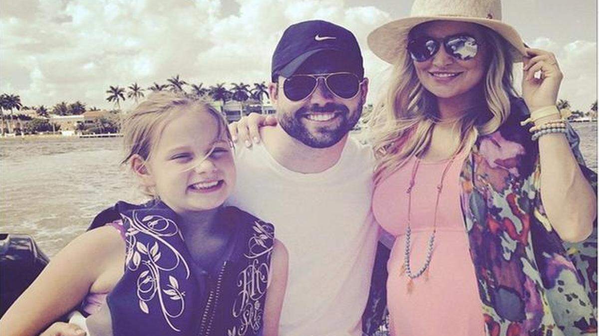
Emily Maynard with husband Tyler Johnson and daughter Ricki on spring break.
