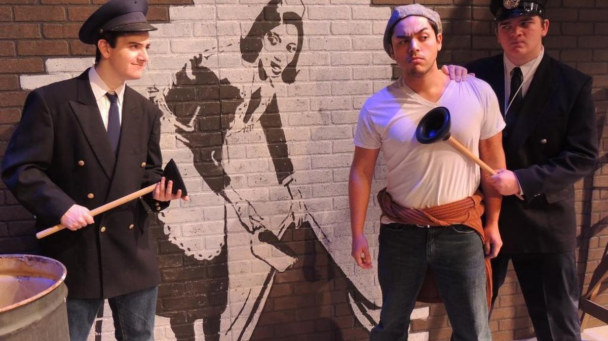 Matthew Cristante, Nick Pardo and Rickhard Moore III (left to right) star in “Urinetown.”