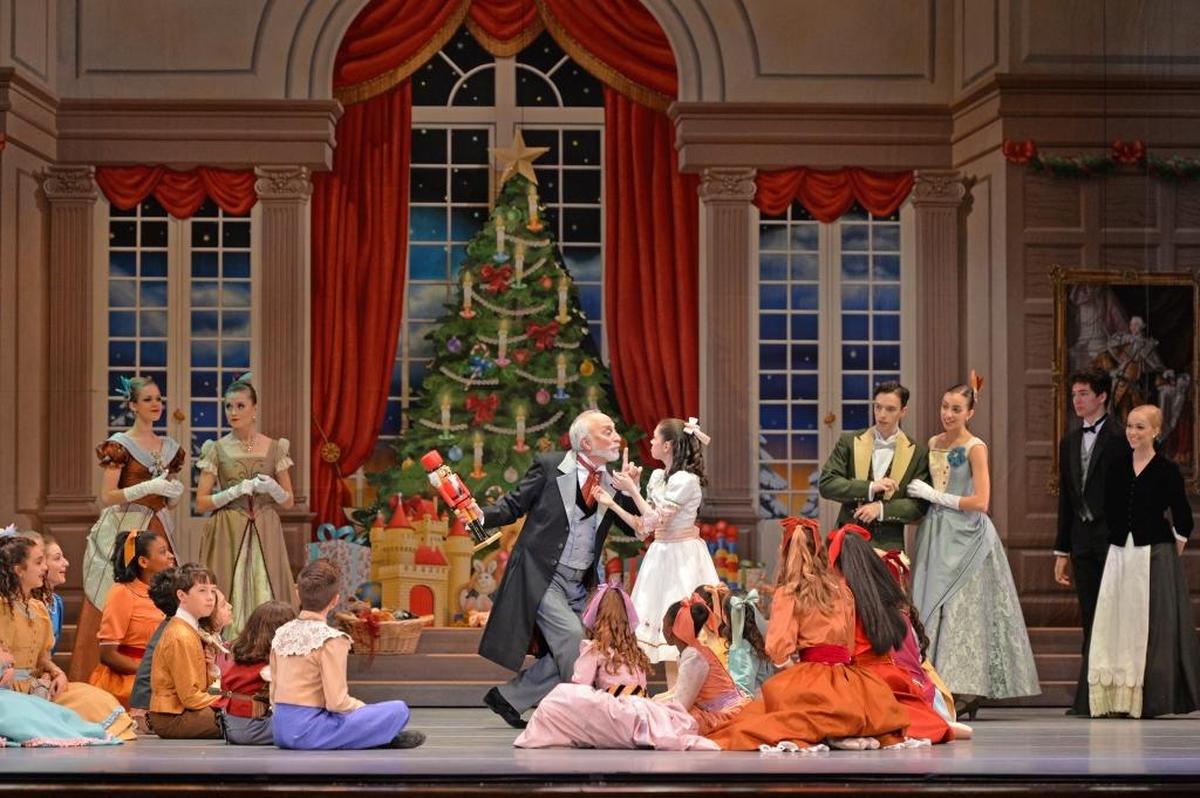 Mark Diamond’s Drosselmeyer reassures Rosie Morrison’s Clara that her Christmas gift can be repaired in this file photo of Charlotte Ballet’s “Nutcracker.” The popular show returns this December.