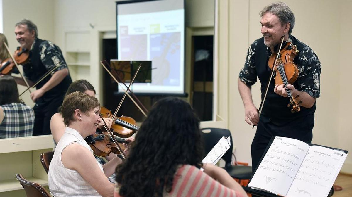 Mark O’Connor leads a class for violin teachers at Midwood International Cultural Center in this 2016 file photo. Tenants of the cultural center were recently told the building will be sold and they will need to leave by 2023.