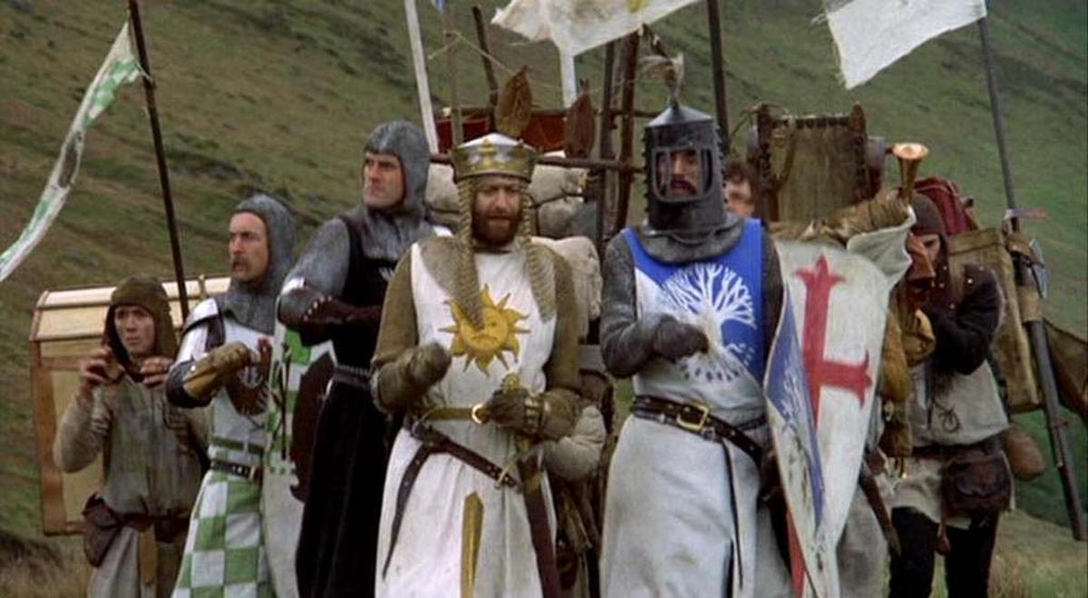 King Arthur (Graham Chapman, center) and his knights pause in their search in “Monty Python and the Holy Grail.” John Cleese is third from left.