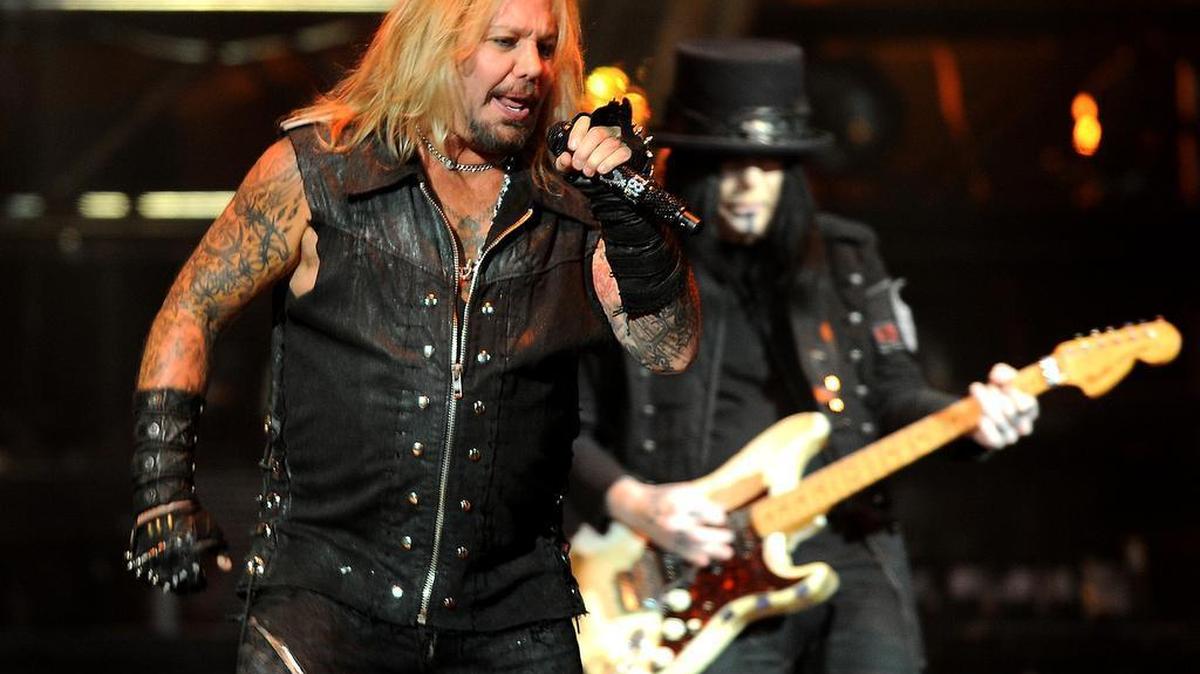 
Motley Crue lead singer Vince Neil, left, and Mick Mars, right, perform at Time Warner Cable Arena in Charlotte, NC on Saturday, August 29, 2015.

