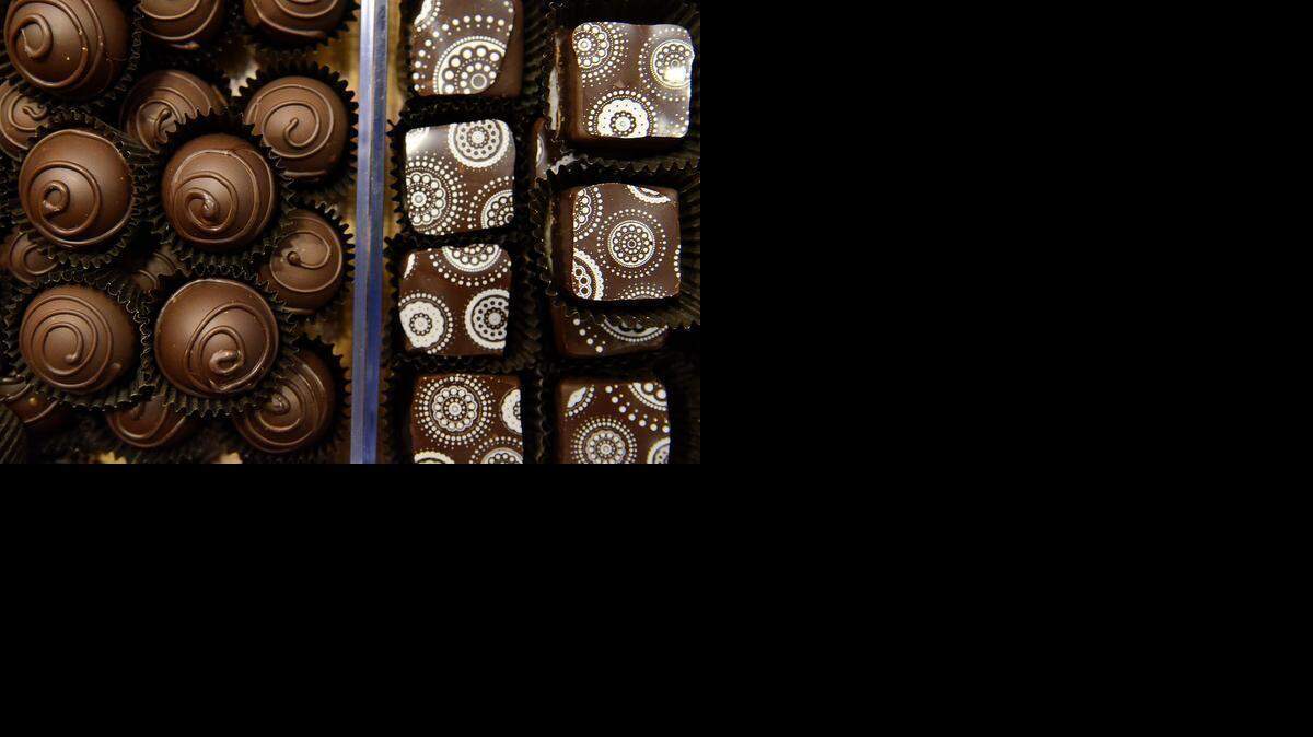 
T is for Treats: Give your valentine chocolates such as these Basil Truffles, left, and Vanilla Bean Truffles from  The Secret Chocolatier.
