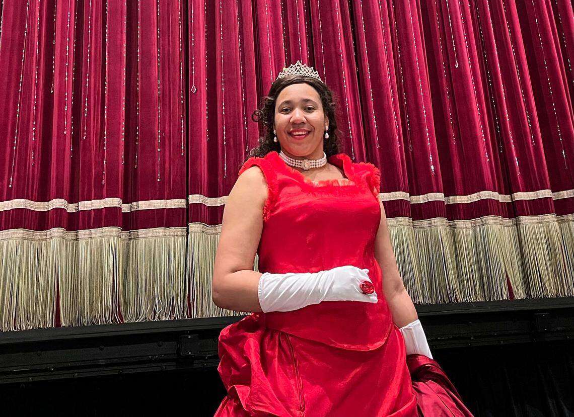 Jasminn McDonald is all dressed up for the re-opening of the historic Carolina Theater in uptown. The theater finally re-opened after 47 years.