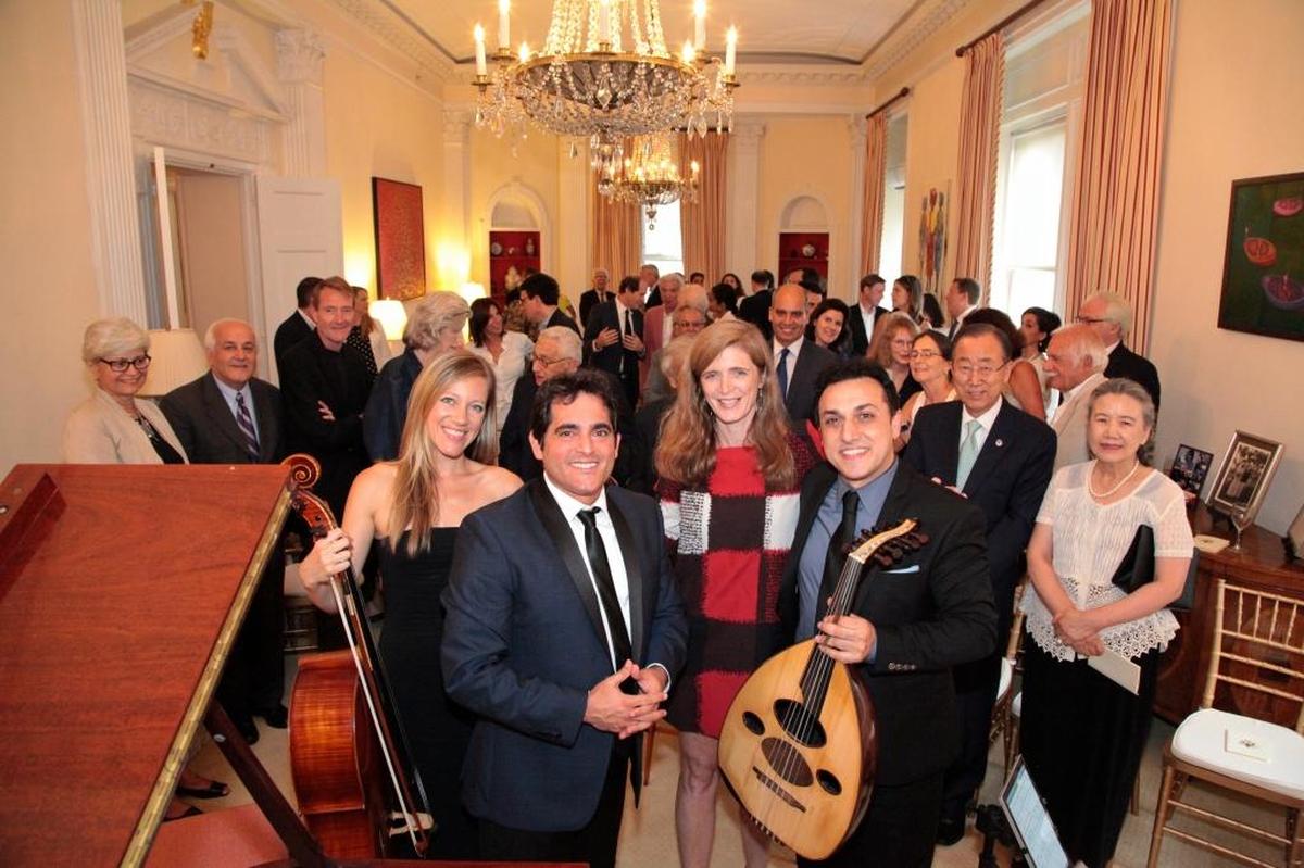 Malek Jandali, front left, at a concert he performed for Henry Kissinger and U.N. Secretary General Ban Ki-Moon in New York in 2015.
