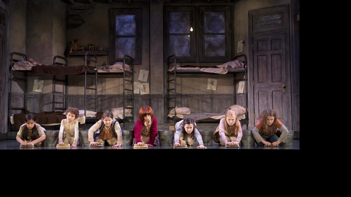 
The orphans of “Annie” (led by Issie Swickle, center, as the title character) acknowledge “It’s a Hard-Knock Life.” The show runs in Charlotte at Belk Theater July 14-19.
