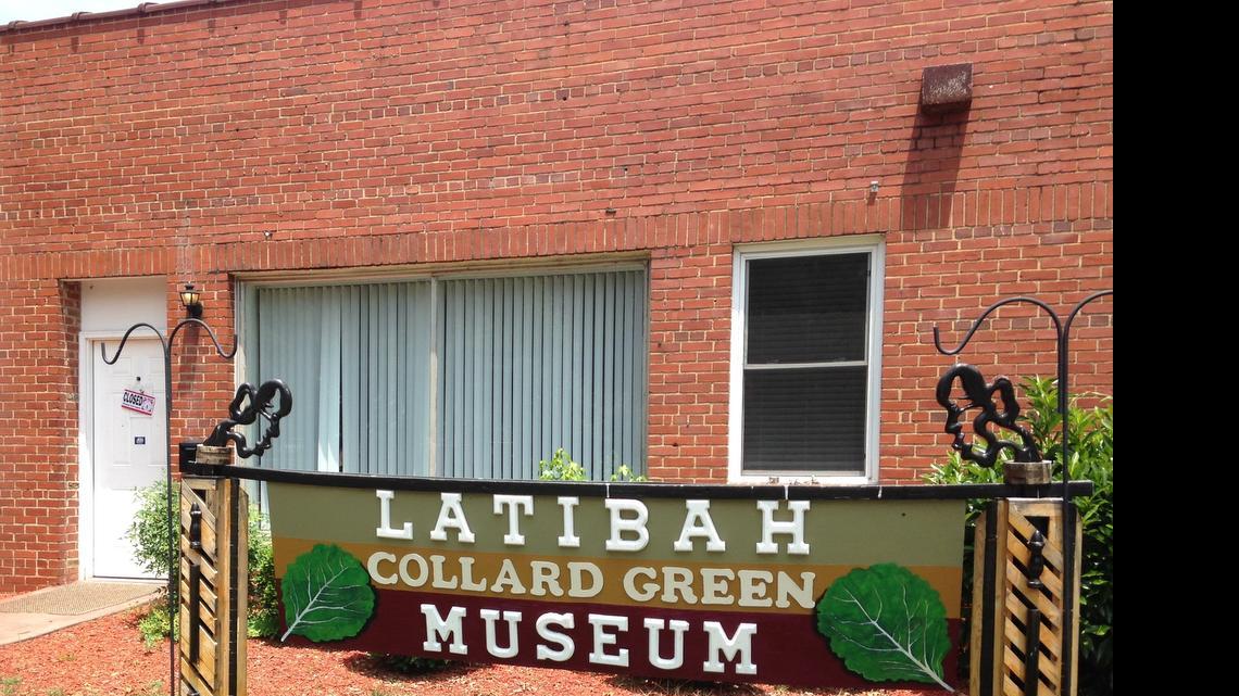 
A “closed” sign hangs on the door of the Latibah Collard Green Museum. 
