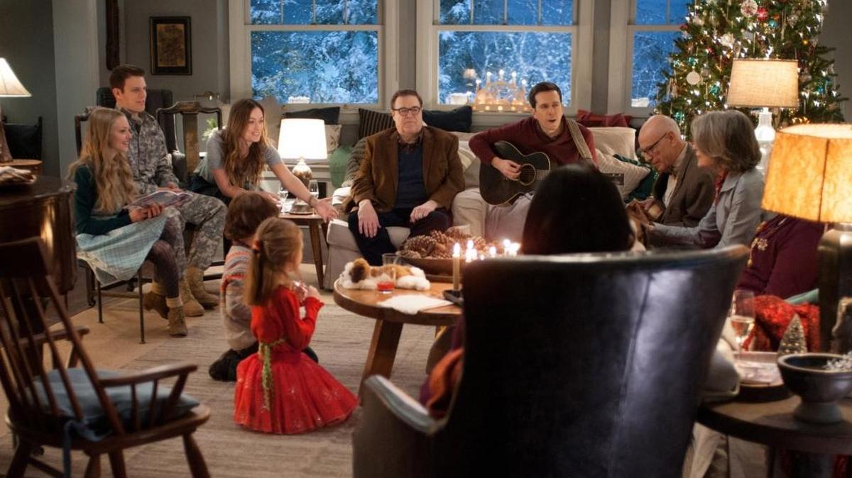 This photo provided by CBS Films and Lionsgate shows, Amanda Seyfried, from left, as Ruby, Jake Lacy, as Joe, Olivia Wilde, as Eleanor, Maxwell Simkins, as Bo, Blake Baumgartner, as Madison, John Goodman, as Sam, Ed Helms, as Hank, Alan Arkin, as Bucky, Diane Keaton as Charlotte, and Alex Borstein (back to camera), in "Love the Coopers," released by CBS Films and Lionsgate. The movie opens in U.S. theaters on Nov. 13, 2015.
