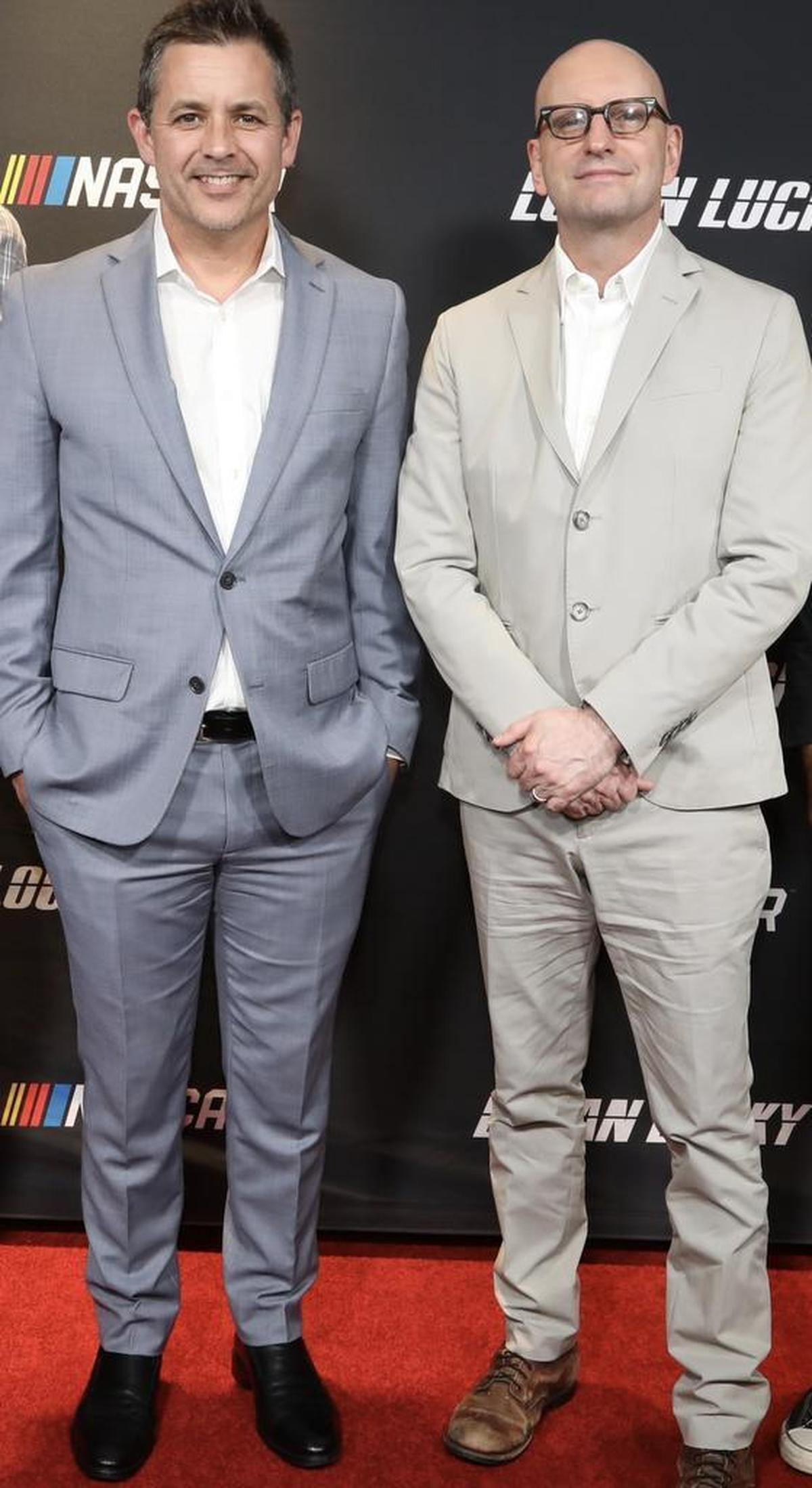 Zane Stoddard, NASCAR’s vice president of entertainment marketing, and director Steven Soderbergh on the red carpet at the Charlotte premiere of “Lucky Logan” at Studio Movie Grill on Aug. 1.