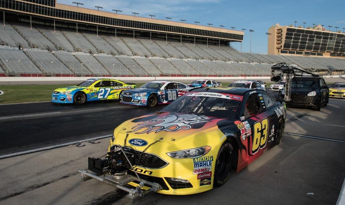 Race cars line up at Atlanta Motor Speedway during the filming of Steven Soderbergh’s “Logan Lucky.”