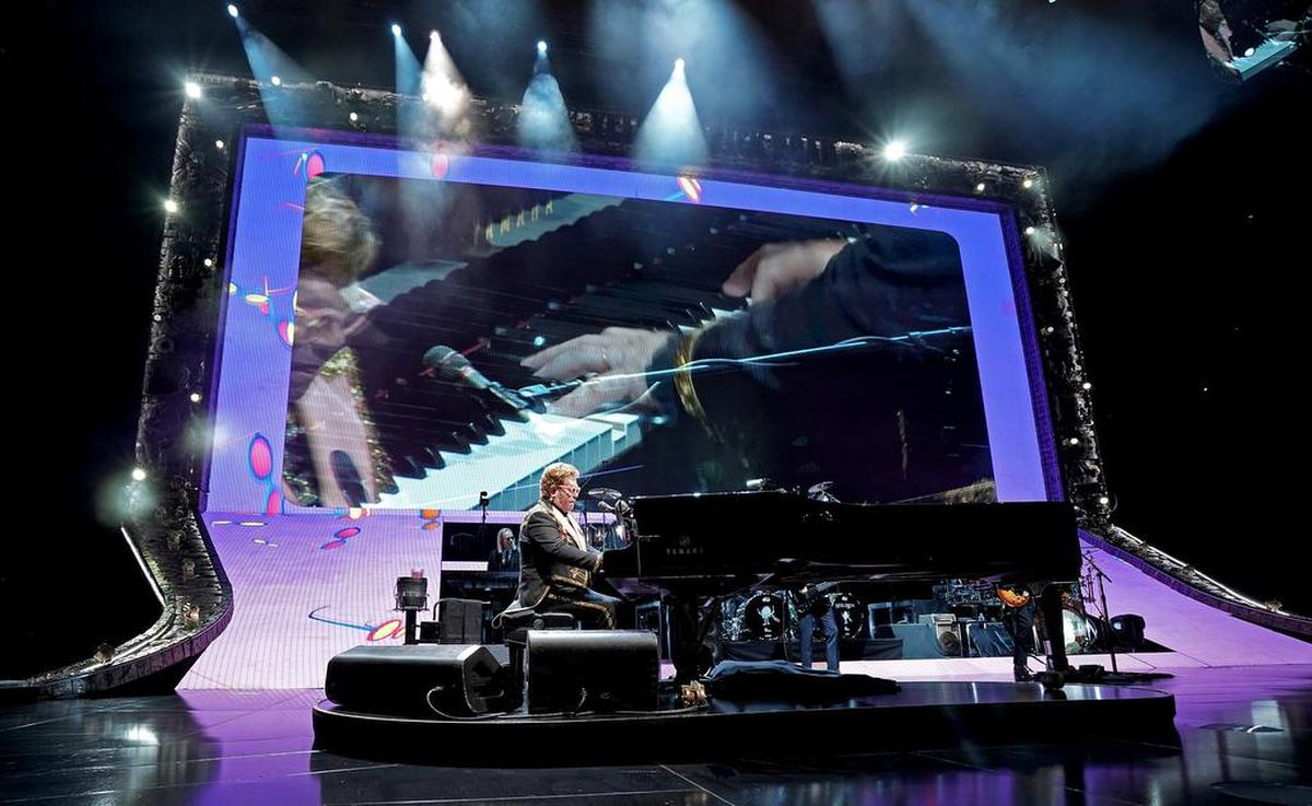 Elton John sings Bennie and the Jets during his Farewell Yellow Brick Road show at Spectrum Center in Charlotte, NC on Wednesday, November 6, 2019.