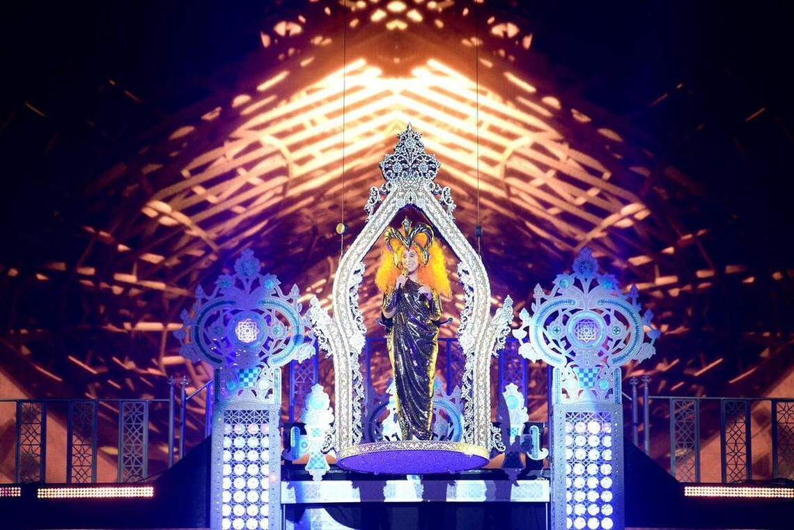 Cher smiles as she is lowered to the stage to begin her performance at Spectrum Center in Charlotte on Tuesday.