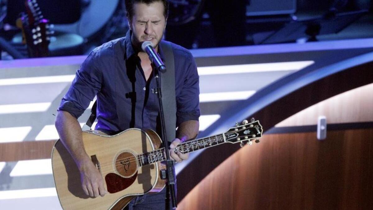Luke Bryan performs at the 10th Annual ACM Honors at Ryman Auditorium on Tuesday in Nashville, Tenn., two nights before his Charlotte show.