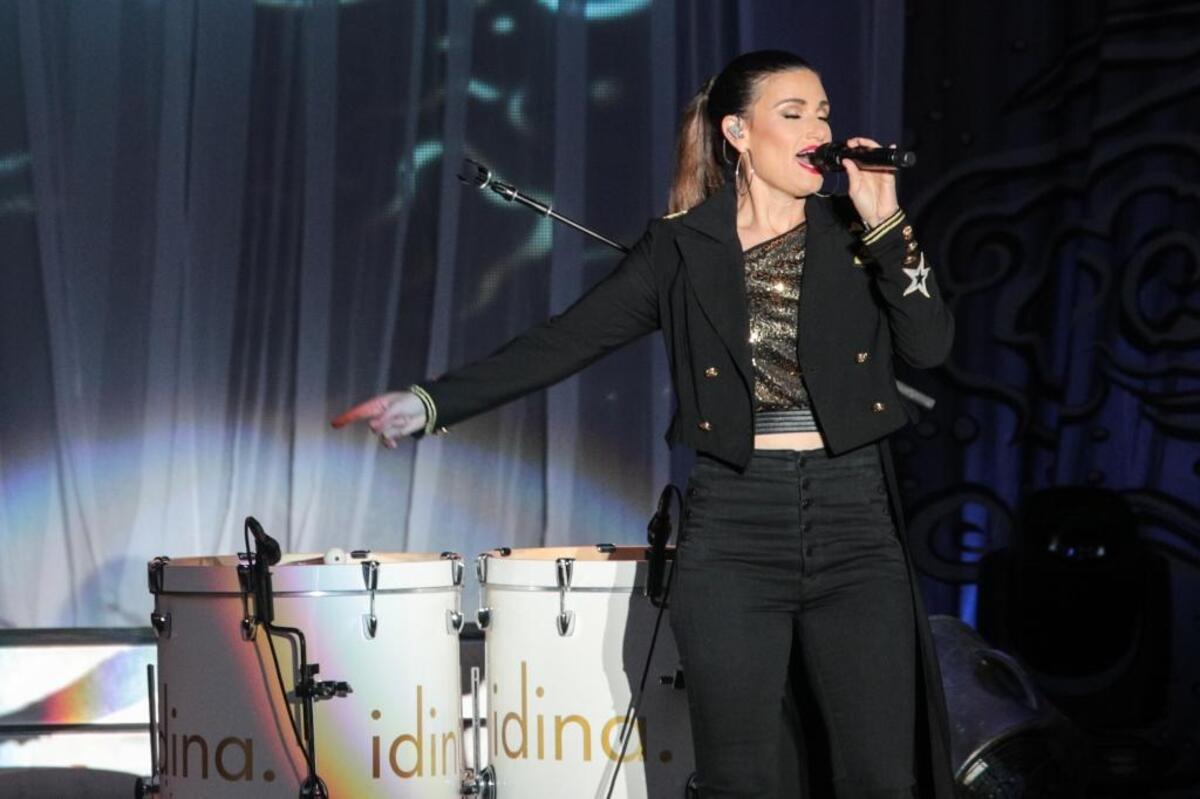 Idina Menzel sang several songs from “Wicked.” She said her all-green makeup as Elphaba, the Wicked Witch of the West, “was pretty but you know it’s a pain in the butt.”