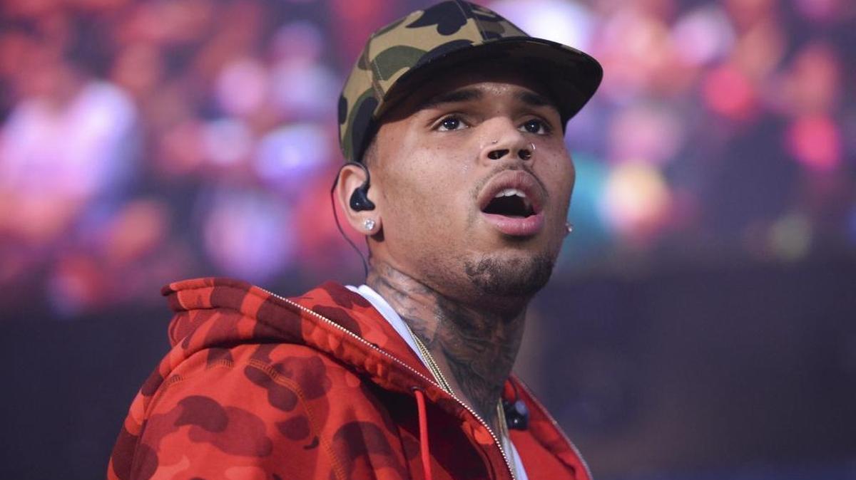 In this June 7, 2015, file photo, rapper Chris Brown performs at the 2015 Hot 97 Summer Jam at MetLife Stadium in East Rutherford, N.J. Soulja Boy said on Twitter Feb. 20, 2017 that his planned boxing match with Brown is off.