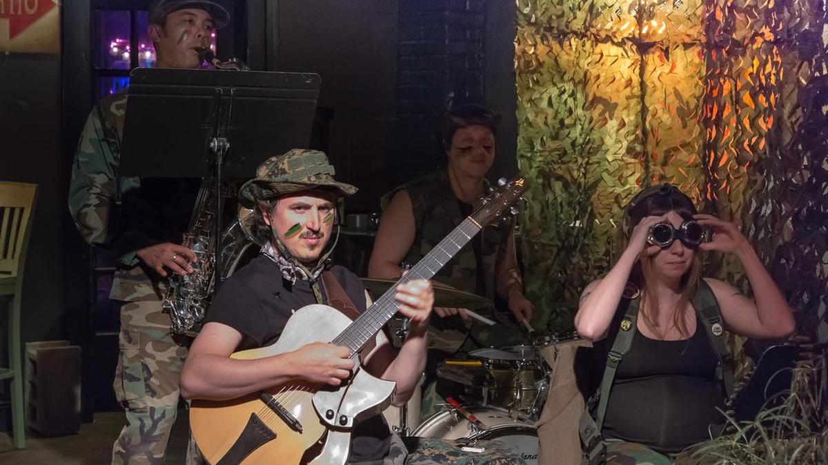 Charlotte musician and music instructor Molly Jay and vegan chef Julia Simon’s musical sendup of the ’80s Arnold Schwarzenegger sci-fi flick “Predator,” as staged at Petra’s last year.