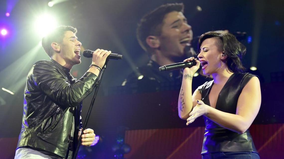 Nick Jonas, left, and Demi Lovato announced that their Charlotte, Raleigh tour stops were canceled because of HB2 Monday.