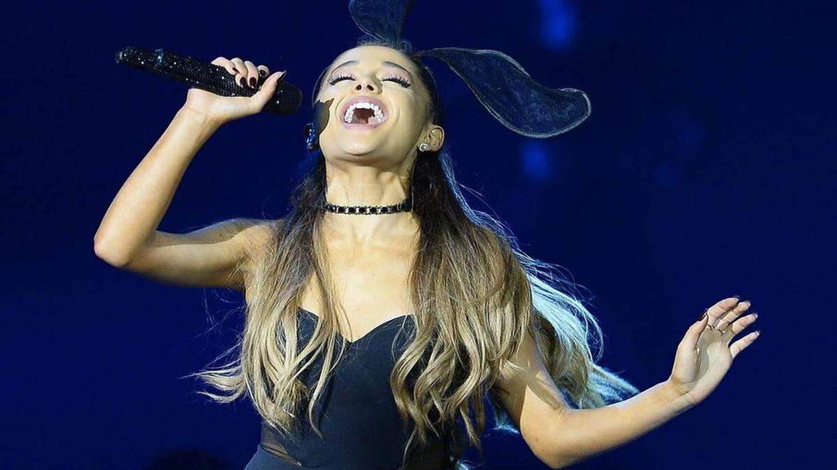 
 Ariana Grande performs on stage at Time Warner Cable Arena on July 21,2015.

