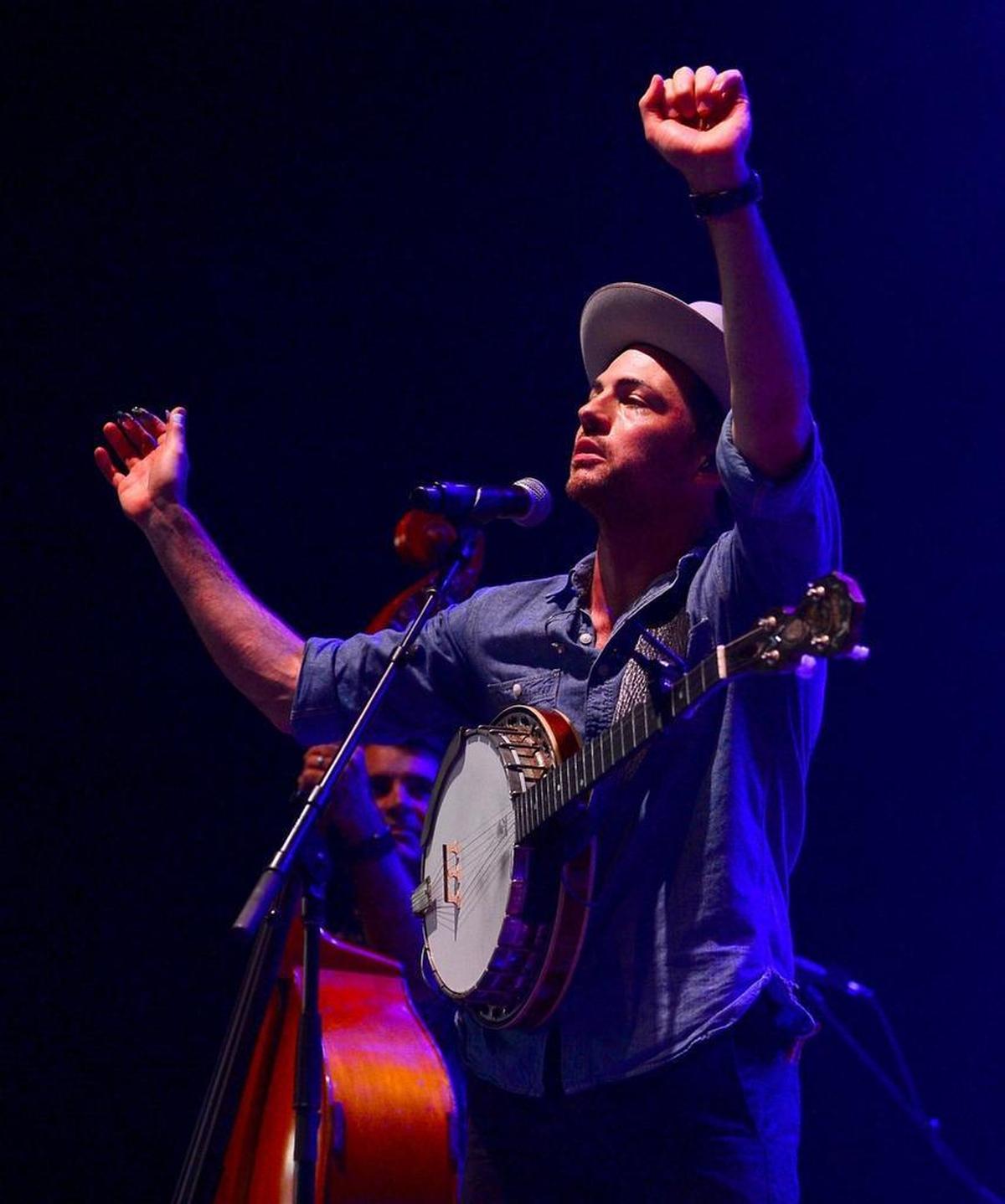 Scott Avett performs during The Avett Brothers’ set at PNC Music Pavilion on Wednesday night. (Willie Nelson did not allow photographers to shoot his performance.)