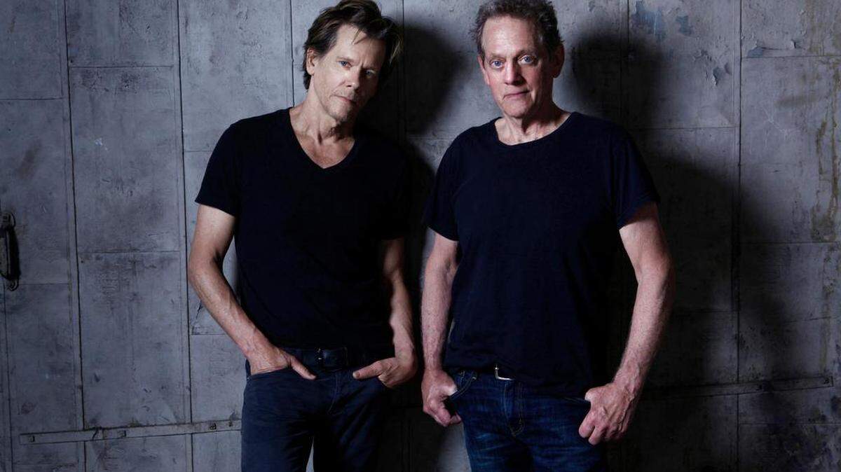 "There's definitely people that just show up because they want to see me in person, and that's fine," says Kevin Bacon (left), with his brother Michael. "I mean, we always knew that. We've known that for 25 years."