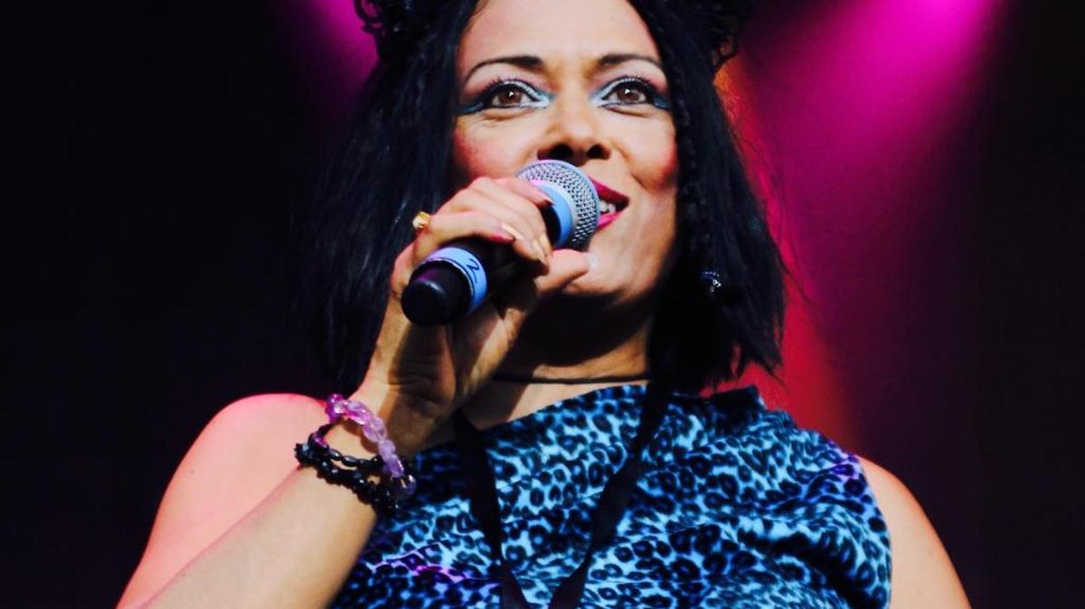 Annabella Lwin performs at Charlotte Metro Credit Union Amphitheatre on Saturday night.