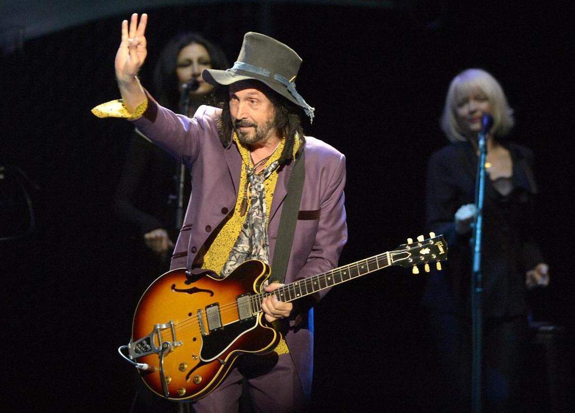 Mike Campbell (formerly of Tom Petty and the Heartbreakers) waves to the fans in Charlotte.