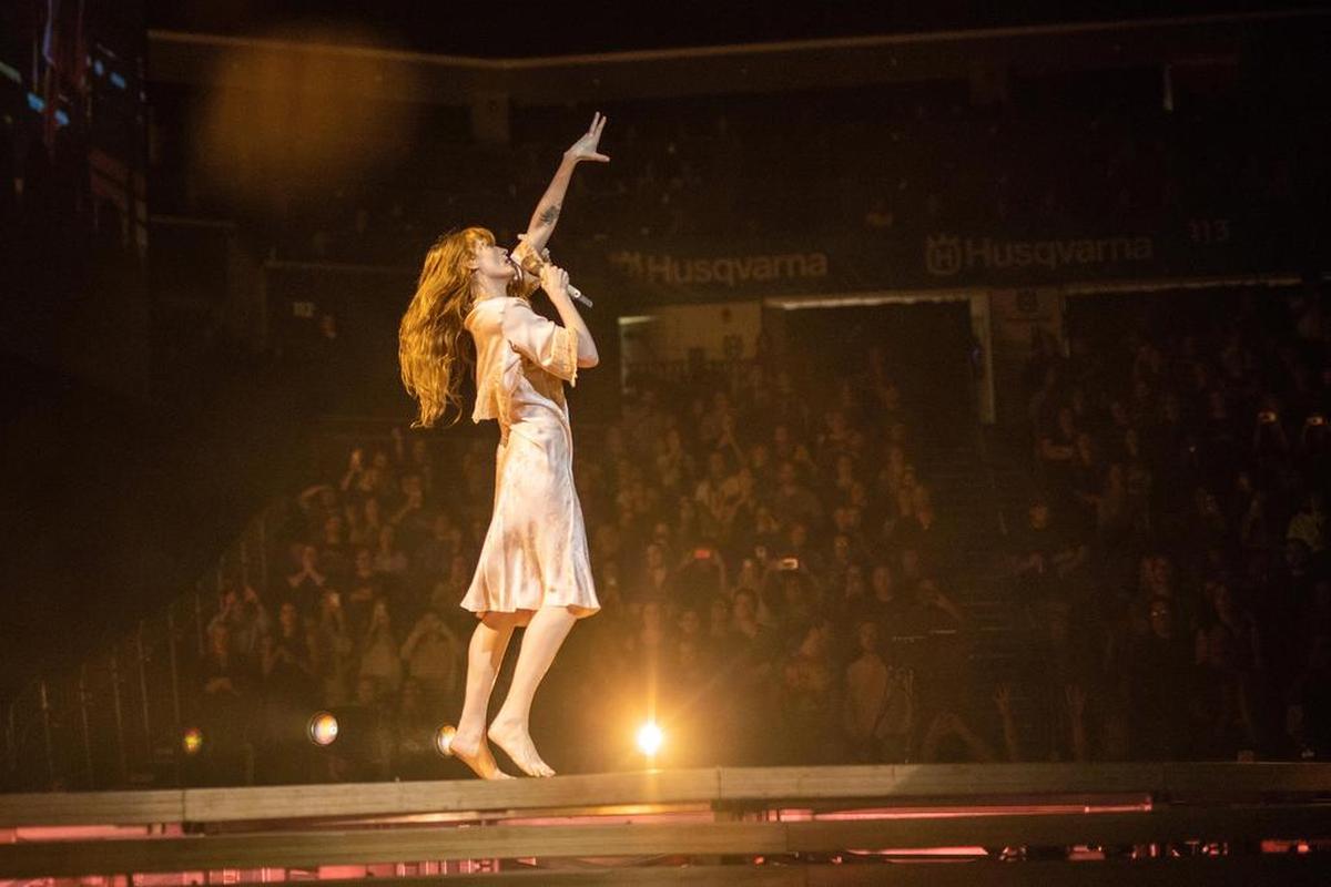 Florence Welch of Florence + the Machine gets the crowd going early in the show.