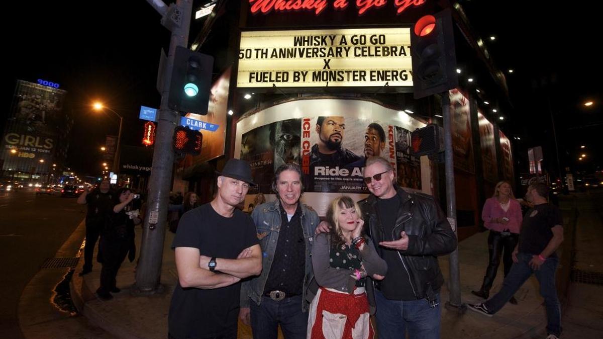 X, from left to right: D. J. Bonebrake, John Doe, Exene Cervenka and Billy Zoom.