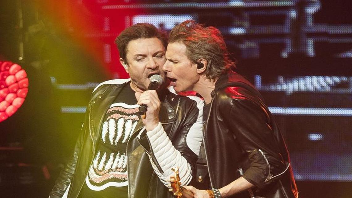 Bass Guitarist John Taylor and Singer Simon Le Bon of the band Duran Duran perform live as their 2016 tour kicks off at the Durham Performing Arts Center on March 28, 2016 in Durham.
