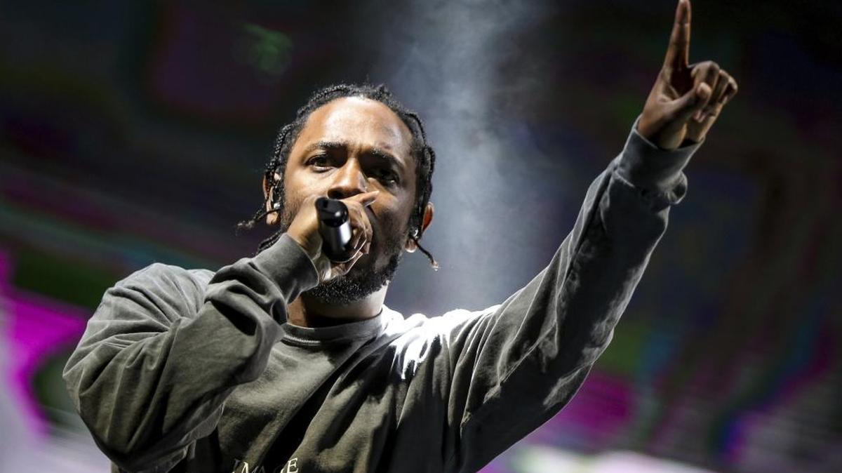 In this Aug. 27, 2016 file photo, Kendrick Lamar performs at FYF Fest in Los Angeles. Lamar’s third official studio album, “DAMN.” has sold over 1 million albums in just three weeks, and has spent all three weeks at No. 1 on Billboard’s 200 albums chart.