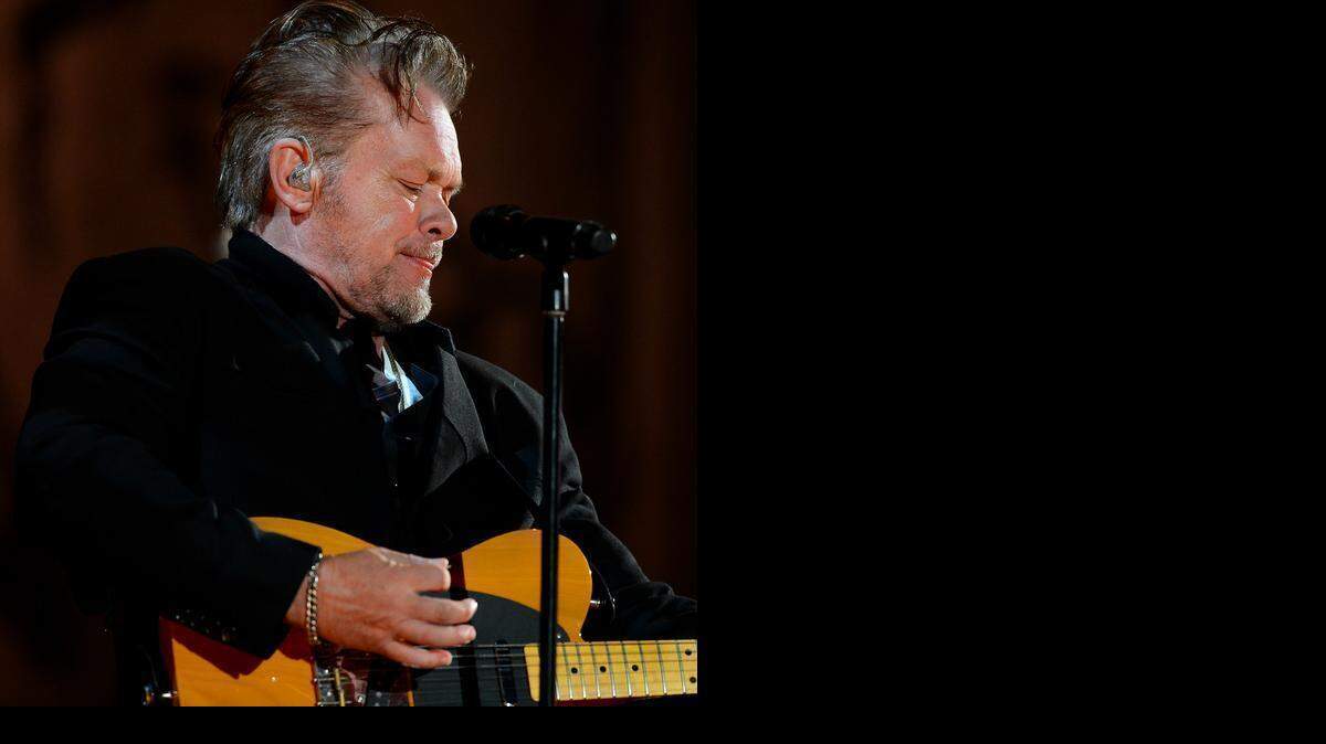 
John Mellencamp performs during his Plain Spoken Tour at Ovens Auditorium in Charlotte, NC on Friday, March 27, 2015.
