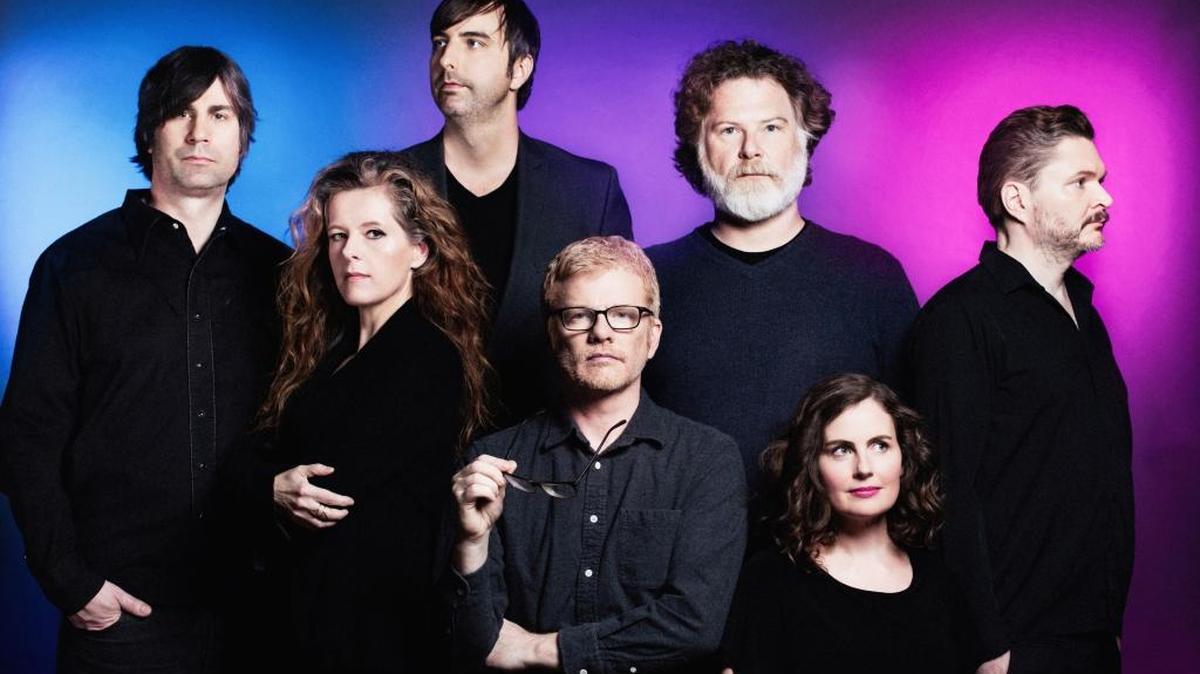 The New Pornographers (pictured) perform with Spoon at Charlotte Metro Credit Union Amphitheatre on Tuesday night.