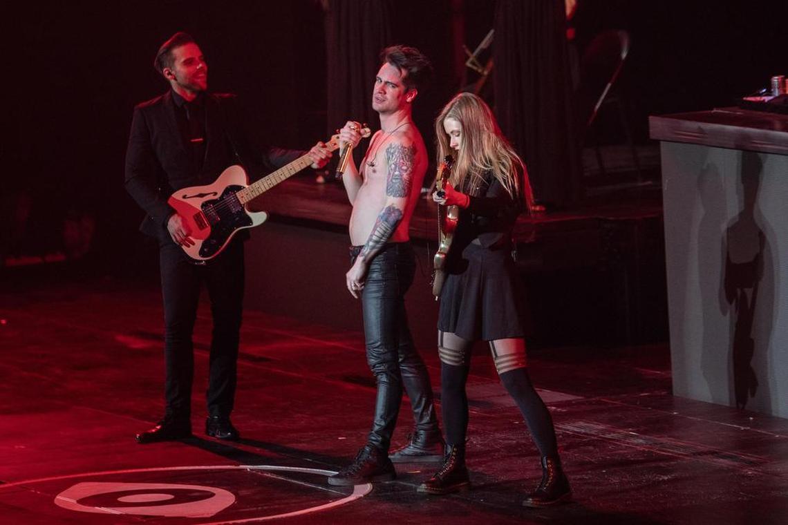 Brendon Urie with touring bassist Nicole Rowe and touring guitarist Mike Naran, late in Tuesday night’s show.