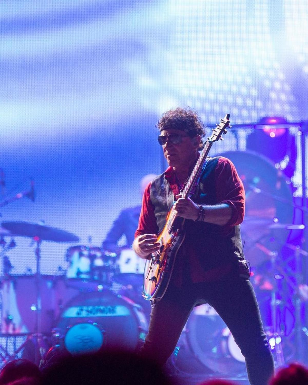 Journey lead guitarist Neal Schon at Spectrum Center on Saturday night.