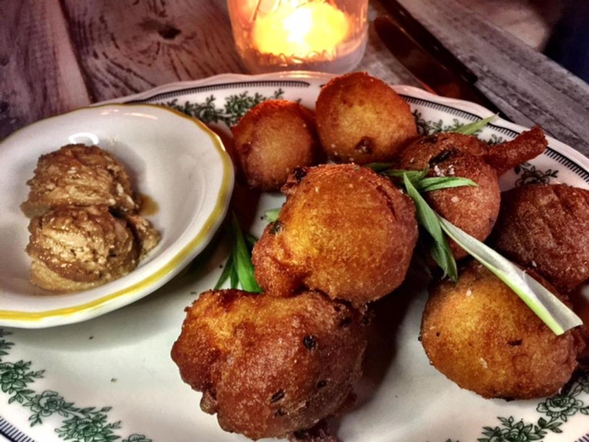 Haberdish’s crisp hush puppies come with a sweet tea butter.