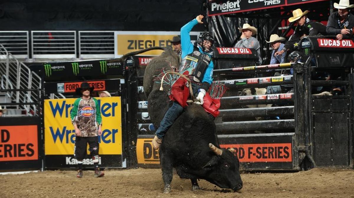 Cody Nance attempts to ride Bailey Pro Rodeo’s Dakota Storm during the first round of the Des Moines Built Ford Tough series PBR.