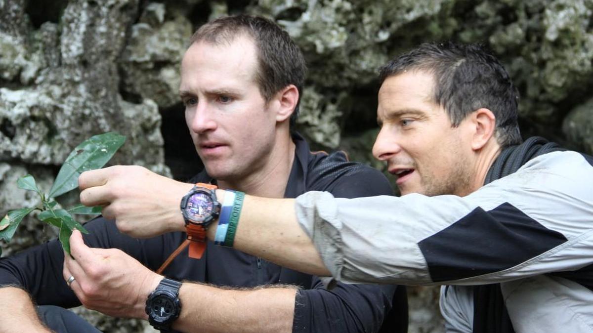 
 Drew Brees (left) with Bear Grylls in Panama’s Camino de Cruces jungle. 
