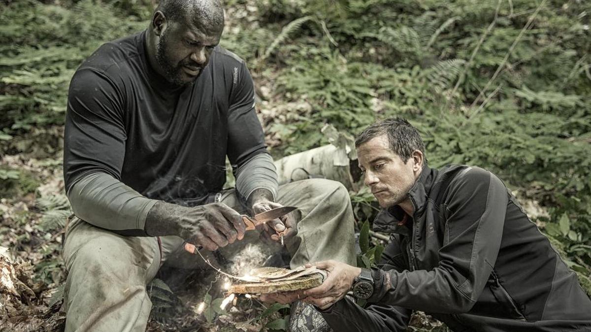 Shaquille O'Neal, left, and Bear Grylls.