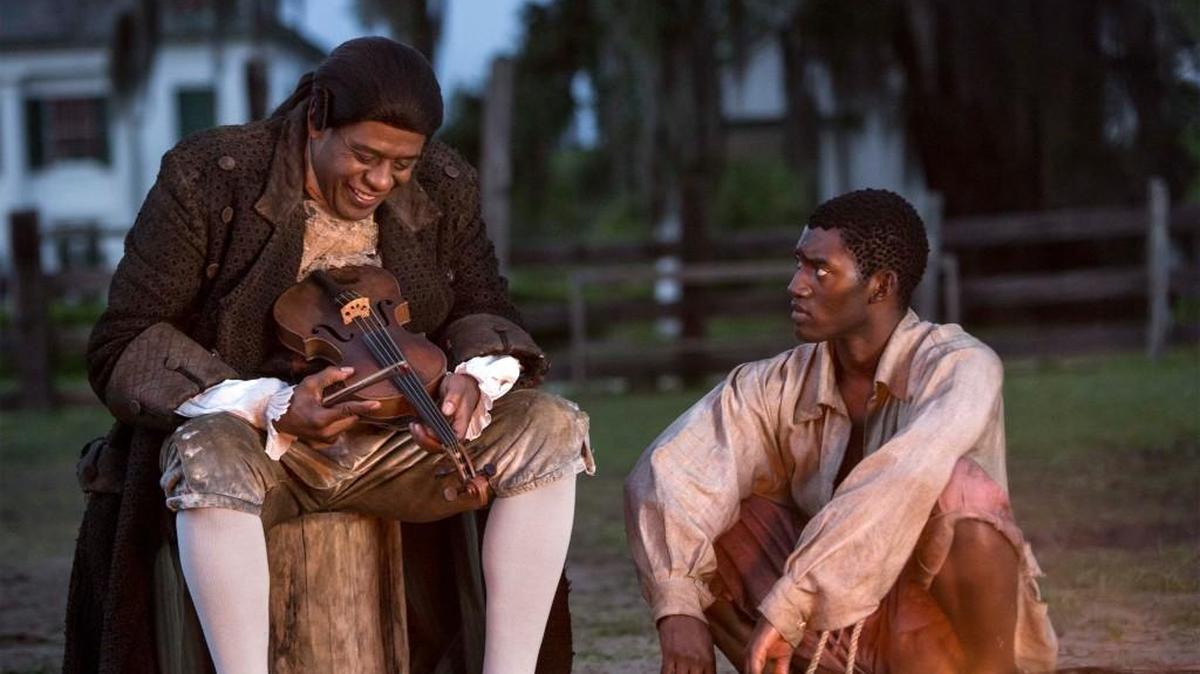 Fiddler (Forest Whitaker, left) and Kunta Kinte (Malachi Kirby) in “Roots.”