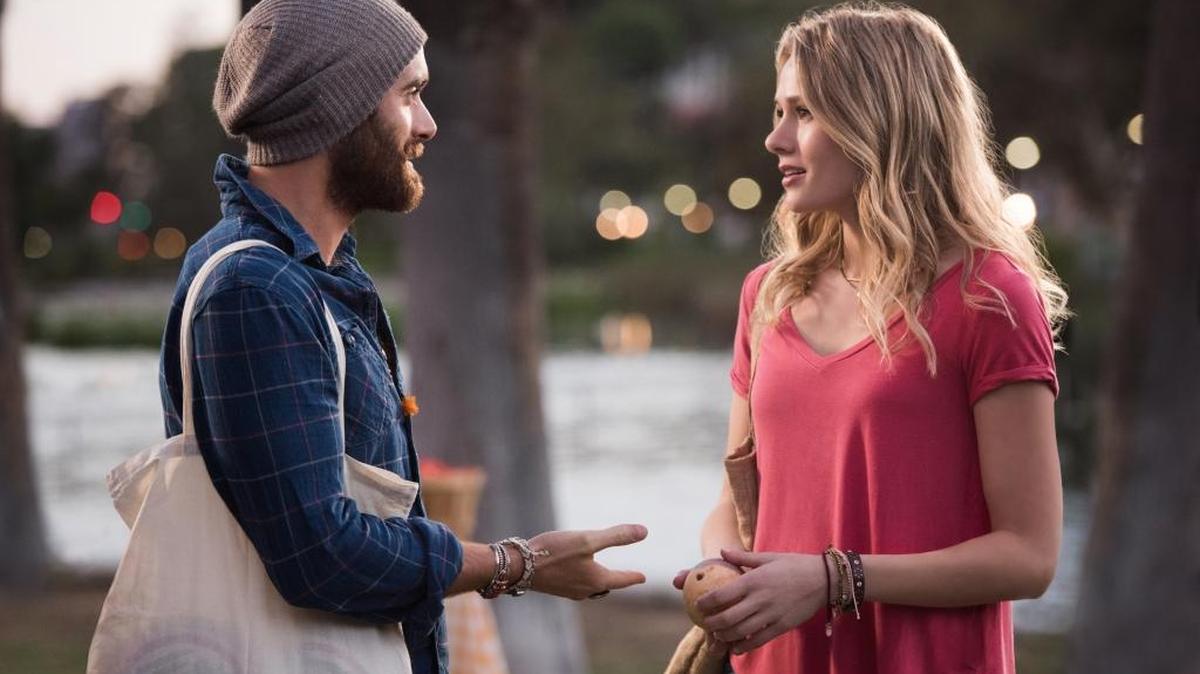 Joshua Sasse, left, as Xavier and Tori Anderson as Evie in The CW’s “No Tomorrow.”