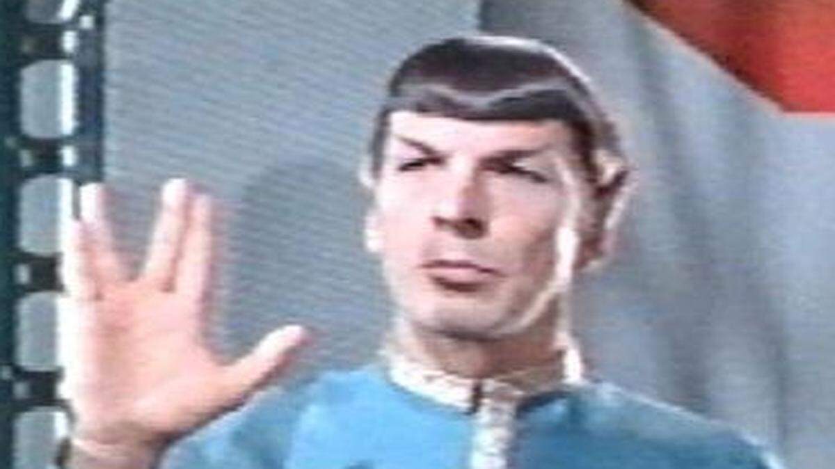 
Screen grab of Mr. Spock, actor Leonard Nimoy, left, giving the Vulcan salute on an episode of 1967 Star Trek entitled "Journey to Babel". Credit Paramount Television. Dr. McCoy, actor DeForrest Kelley, stands to the right

