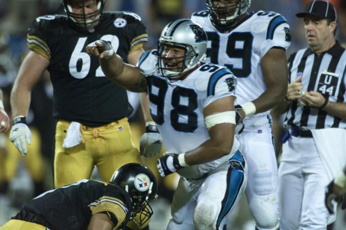 Esera Tuaolo, shown here celebrating a sack during a Panthers game against Pittsburgh in 1999.