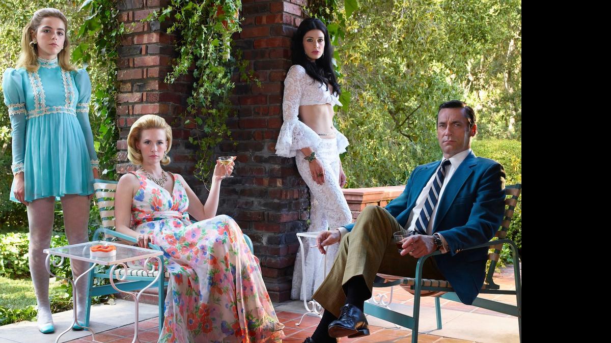 
(L-R): Kiernan Shipka as Sally Draper, January Jones as Betty Francis, Jessica Pare as Megan Draper and Jon Hamm as Don Draper, in the final season of AMC’s “Mad Men.” 

