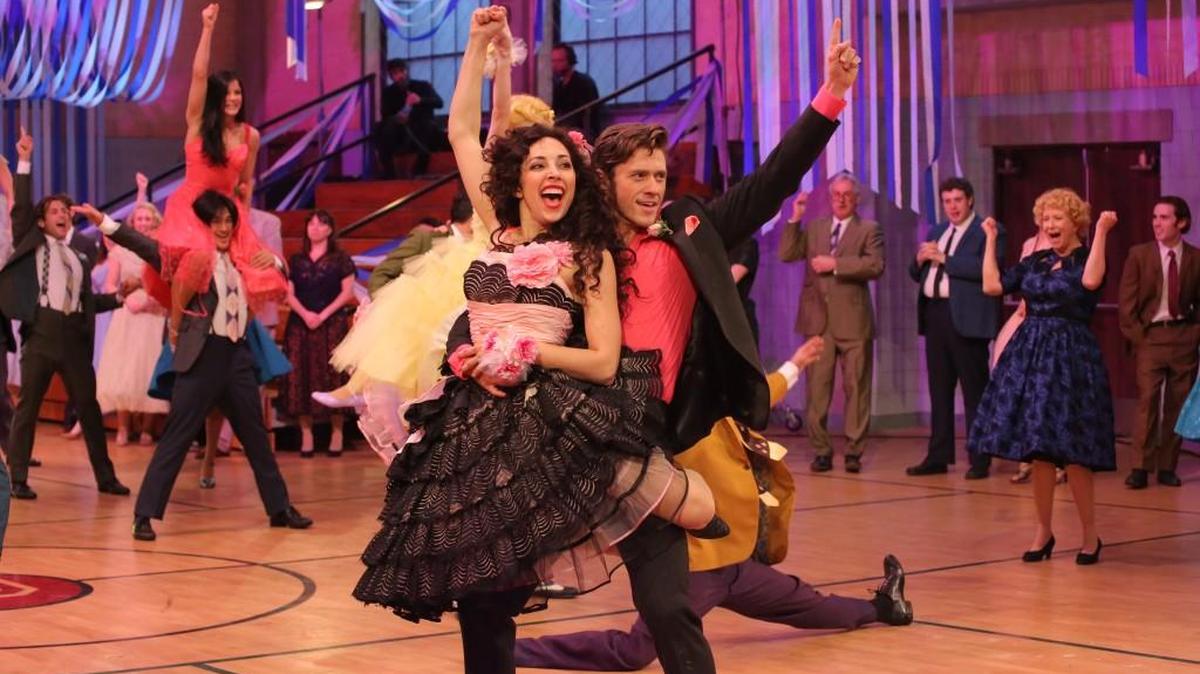 Yvette Gonzalez-Nacer (left) and Aaron Tveit rehearse for “Grease: Live” airing live Sunday.