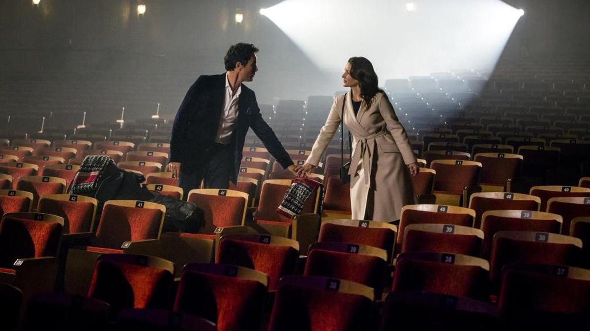 Eric McCormack, left, and Kristin Davis in “A Heavenly Christmas.”